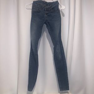 Blue skinny jeans size 0 Premium Jeans, 5 pockets total, one button and 1 zipper